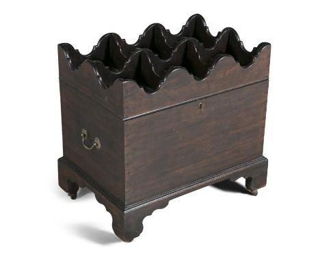 A GEORGE III MAHOGANY RECTANGULAR CELLARET, the hinged top with segmented bottle holder, with brass side carrying handles on 