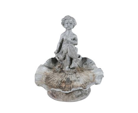 A VICTORIAN LEAD WATER FOUNTAIN BASIN, in the form of a scallop shell with figure perching on the edge. 38cm wide, 40cm high