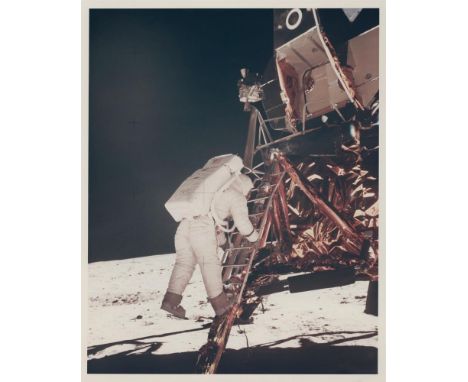 Neil ArmstrongBuzz Aldrin walks down the ladder as he prepares to take his first steps on the surface of the MoonApollo 11, 2
