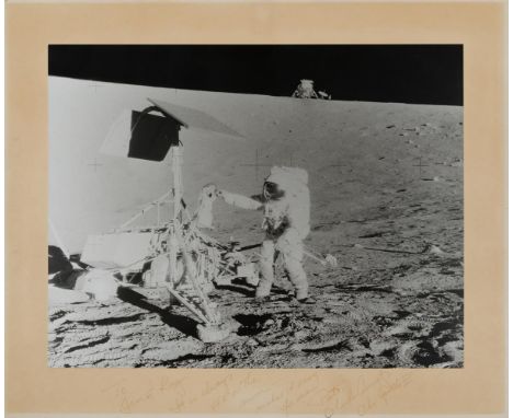Alan BeanCharles Conrad inspects Surveyor 3 during the first reunion of a human with a robotic probe on the surface of the Mo