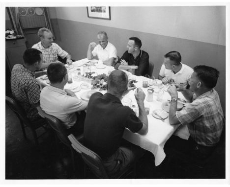 A view of the Mercury astronauts sharing breakfast with their doctor, Dr. William K. Douglas, on the morning of Alan Shepard'