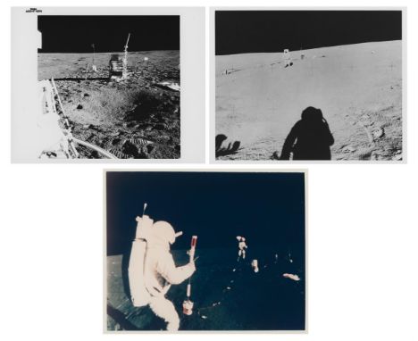 Alan Shepard and 16mm television cameraThree views of the crew deploying scientific experiments on the lunar surface; the col