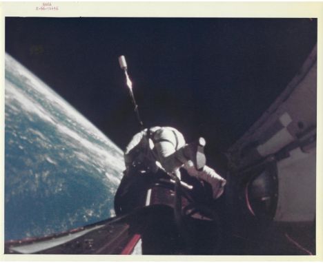 Charles ConradRichard Gordon ties a tether to the Agena vehicle during EVAGemini 11, 13 September 1966Vintage chromogenic pri