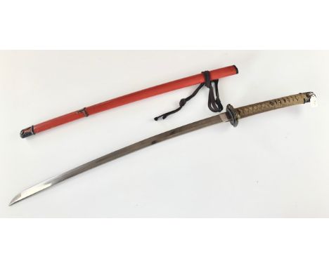 A Japanese Gendaito katana sword, the tsuka bearing menuki modelled as arrow heads, the kashira, fuchi, tsuba and scabbard mo