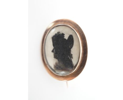 A George III brooched miniature portrait silhouette of Naval Captain James Alms (1728 - 1791) officer of the Royal Navy, pain