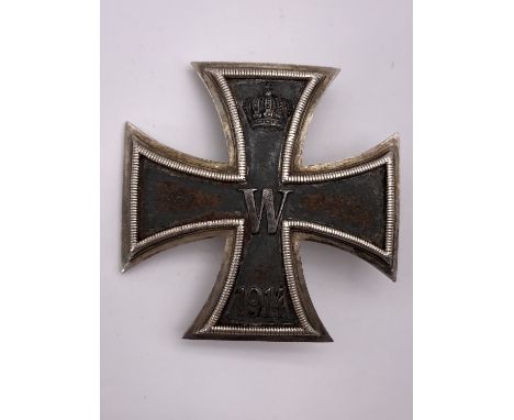 A 1914 Iron Cross first class, of convex form, pin and back stamped "935"