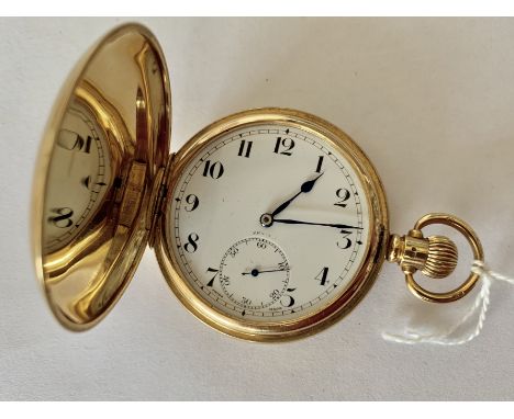 A Zenith 18ct gold hunter cased pocket watch, having a crown-wound movement and circular enamelled face with subsidiary secon