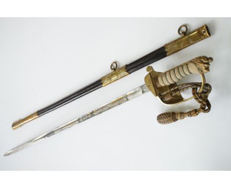 A George VI Naval officer's sword by Wilkinson, with cover. [That of one John Fagan Duckworth, Lieutenant 1 Sept 1941, Lt Com