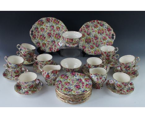 A Royal Winton Grimwades Summertime pattern chintz tea set for twelve, comprising twelve teacups and saucers, two milk jugs, 