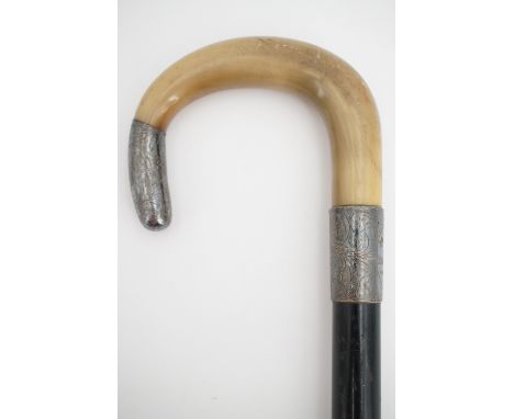 [ Carlisle Police ] A 1920s silver-mounted and horn handled ebony walking stick, the ferule engraved "To W Todhunter from [Ca