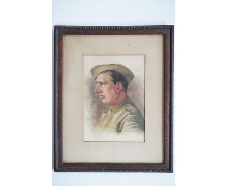 A Great War watercolour portrait of a member of the Royal Flying Corps, in period mount and oak frame under glass, 36 cm x 29