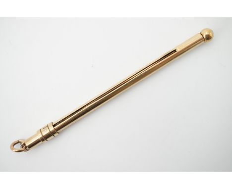 A 9ct gold fob champagne / cocktail swizzle stick, 5.2g