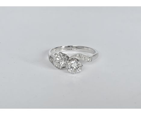 A vintage 18ct white gold, platinum and two-stone diamond ring, the brilliant-cut diamonds, each of approximately .50ct, crow