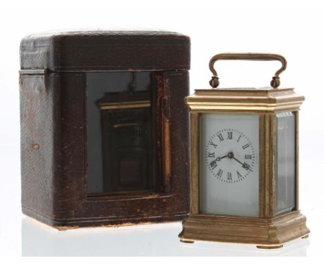 Reproduction miniature carriage clock timepiece, within a stepped brass case, 3.75" high (key); also with an outer Morocco le