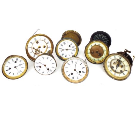 Seven various French mantel clock movements, the largest with 4.75" chapter ring enclosing a recessed visible escapement (7)