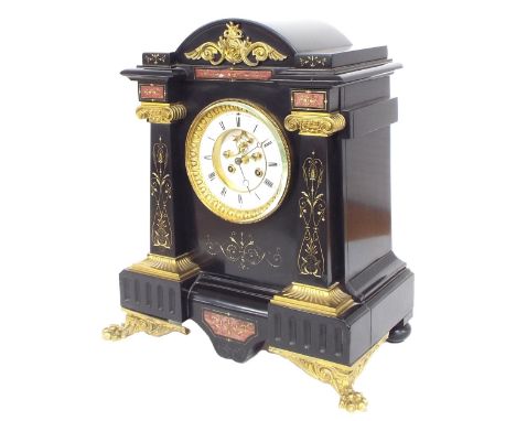 Good French black marble and ormolu mounted ornate two train mantel clock, the 4.5" white chapter ring enclosing a recessed c