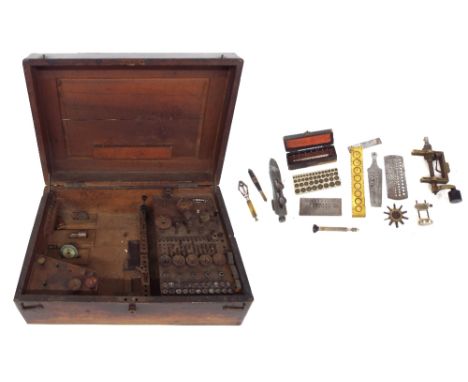 Fitted wooden hinged case containing a quantity of lathe accessories; together with a box of miscellaneous clock/watchmakers 