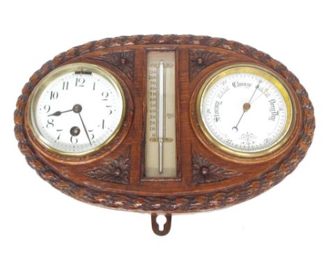 Good clock and barometer wall compendium, the 3.25" twin dials either side of a thermometer, within a foliate carved oval cas