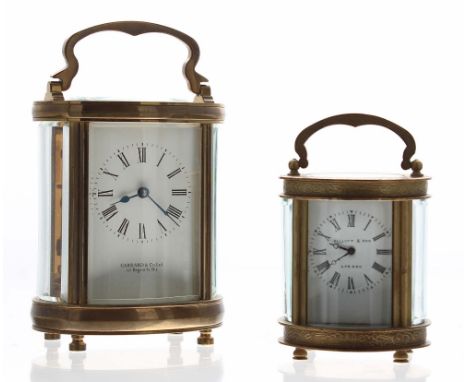 Oval carriage clock timepiece, the dial signed Garrard &amp; Co. Limited, 112 Regent St. W1, 6.25" high; also a small oval ca