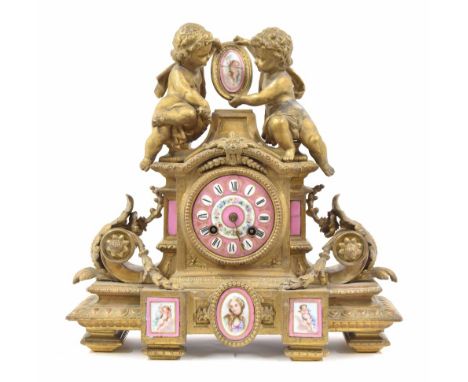 French ormolu and porcelain mounted two train mantel clock, the movement back plate stamped with the initials J.T within an o