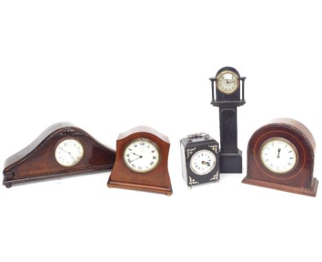 Ebonised carriage type clock timepiece with fixed wind movement, 6.5" high, miniature ebonised longcase clock stamped H.A.C. 