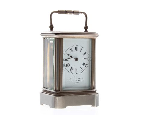 Miniature French carriage clock timepiece, the white dial indistinctly signed ..., Paris below the chapter ring, within a cor