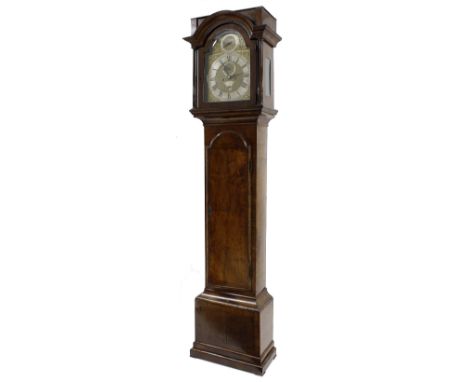 Walnut eight day longcase clock with five pillar movement, the 12" brass arched dial signed James Scholefield, London on an a