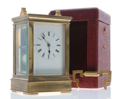 Repeater carriage clock striking on a gong, within a stepped case, surmounted by an ornate handle (detached), 8" high; also w