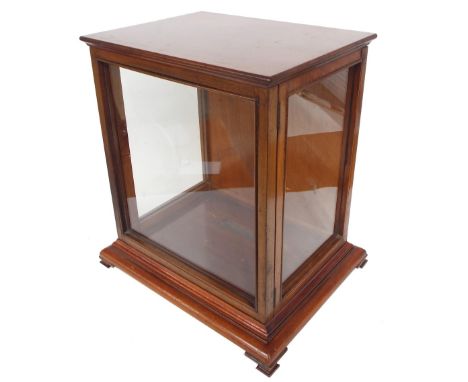Good mahogany glazed display case, upon a stepped plinth base raised upon ogee bracket feet and surmounted by a flat moulded 