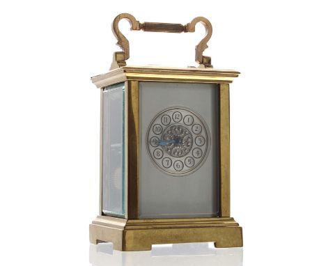 French carriage clock striking on a gong, the 1.75" chapter ring with Arabic numerals enclosing a beaded  C-scroll design cen