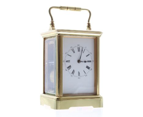Carriage clock striking on a gong, the movement back plate and base stamped no. 28894, within a corniche brass case, 6.5" hig