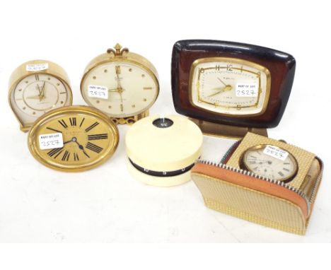 Four various small boudoir clocks by Swiza (2), Europa and Leon Maeght; also a nickel cased pocket watch and a cylindrical Mi