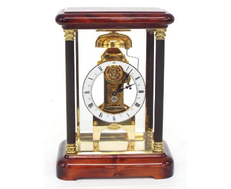 Contemporary ProClocks 'The Tourbillion Crystal Regulator Clock', the 3.75" white chapter ring with skeletonised centre revea