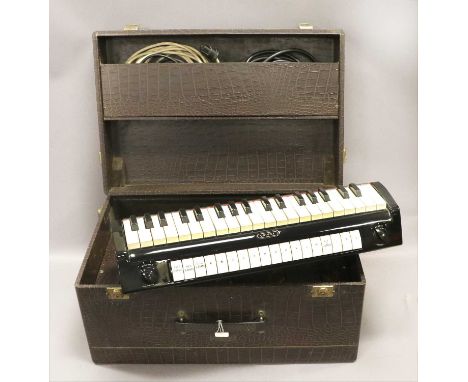 Univox Portable Electric Organ Model J6 manufactured by the Jennings Musical Industries Ltd (Dartford, Kent), with alloy swel