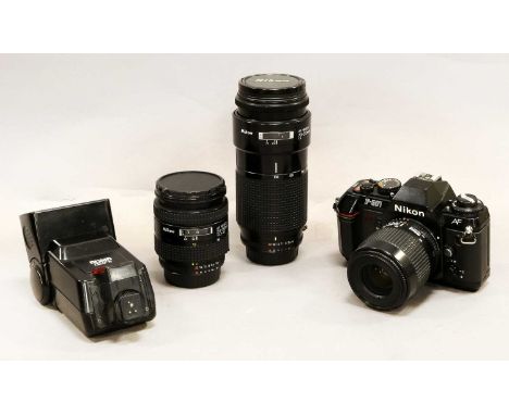 Nikon F501 Camera with Nikkor f4-5.6 35-80mm lens; Nikkor f4 70-210mm and Nikkor f3.3-4.5 24-50mm lenses (in soft carry case)