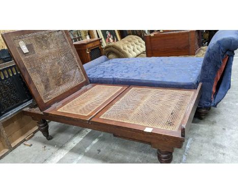 LATE VICTORIAN RATTAN & MAHOGANY CAMPAIGN DAY BED, label for Leveson & Sons, with adjustable back and base, turned legs, larg