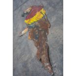 LARGE PAINTED SHEET METAL ORNAMENT OF PERCHED MACAW, probably an advertising sign, 300 x 98cms
