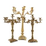 THREE GILT METAL CANDELABRA, comprising pair of five-light candelabra, 61cms (h), and single seven-