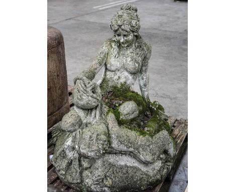 RECONSTITUTED STONE FIGURAL FOUNTAIN, modelled as naked nymph with ewer, putto, beside tambourine and grapevines, upon circul