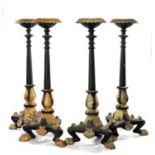 SET OF FOUR PARCEL-GILT, EBONISED & CAST IRON TORCHÈRES, gadrooned rims, reeded columns, leaf cast