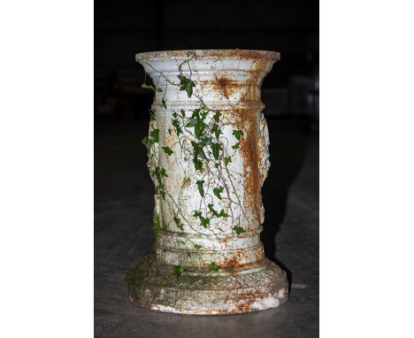 PAIR OF PAINTED CAST IRON PEDESTALS, moulded tops above column bases, decorated with grotesque masks, circular step plinth ba