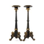 PAIR OF PARCEL-GILT, EBONISED & CAST IRON TORCHÈRES, gadrooned rims to fluted columns and leopard