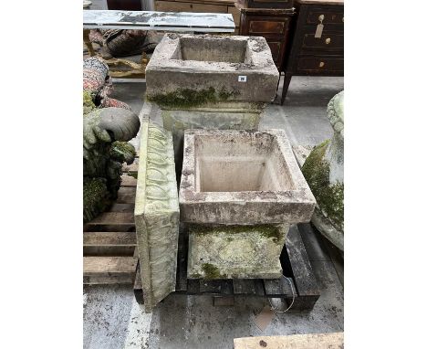 LARGE PAIR OF RECONSTITUTED STONE OR TERRACOTTA PEDESTALS, modelled as Corinthian capitals, 97cms (h).  N.B.  AMENDED IMAGECo