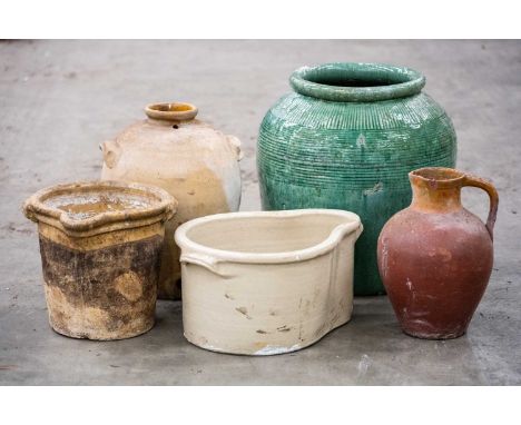 FIVE STONEWARE VESSELS, including large green-glazed plant pot, 59cms (h)Provenance: The Cornelia Bayley Collection from Plas