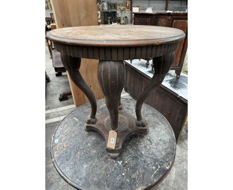 FRENCH CARVED OAK CENTRE TABLE, circular top on bowed lion's paw feet, concave platform base, lion's paw legs, bun feet, 65 (