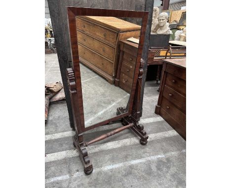 WILLIAM IV MAHOGANY CHEVAL MIRROR, rectangular plate between anthemion topped tablet uprights, trestle end supports and folia