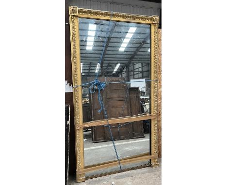 19TH CENTURY LARGE RECTANGULAR GILT FRAMED WALL MIRROR, frame moulded and with applied rosettes to corners, 216 x 142cmsProve