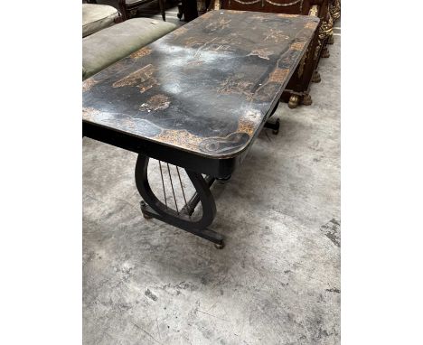 BLACK & GOLD JAPANNED LIBRARY TABLE, chinoiserie decorated top on lyre end supports joined by turned pole stretcher, gilt bun
