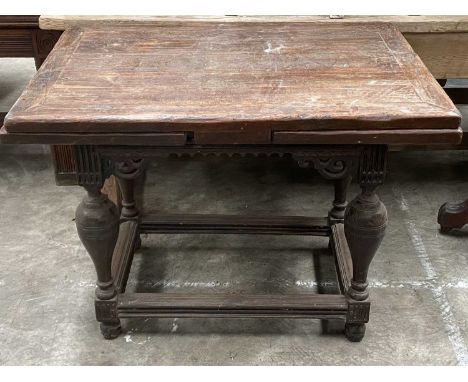 OAK PULL-OUT EXTENDING DINING TABLE, vase shaped supports, rectangular stretcher base, 80 (h) x 107 (w - closed) x 76cms (d)C