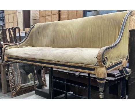 REGENCY STYLE GOLD & BLACK EBONISED SETTEE, upholstered in yellow fabric, down swept acanthus leaf ornamented arms and legs, 